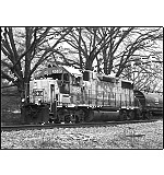 The starkness of winter deserves a lesson in B & W. CSX A700 pulls into Cartersville from it's daily run.